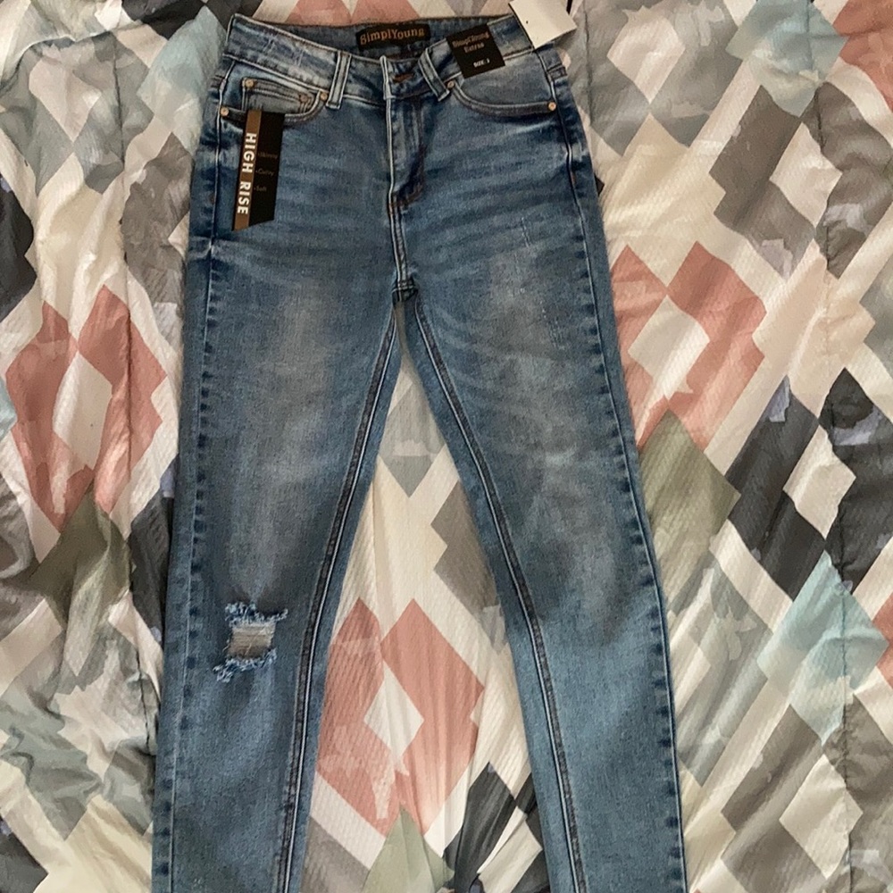 Size 3 skinny blue denim jeans.